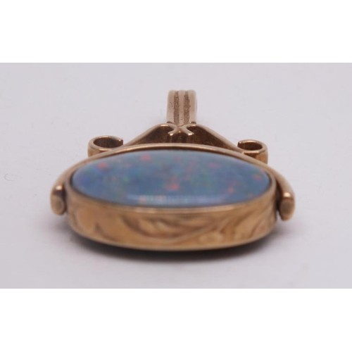 5 - 9ct GOLD OPAL & ONYX SPINNING PENDANT