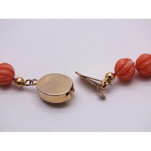 245 - ART DECO CARVED PINK CORAL BEAD 18