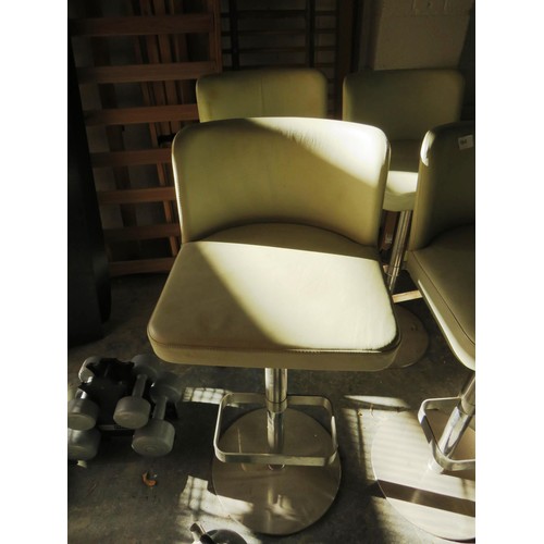 64 - 4 x CREAM LEATHER SWIVEL BAR CHAIRS