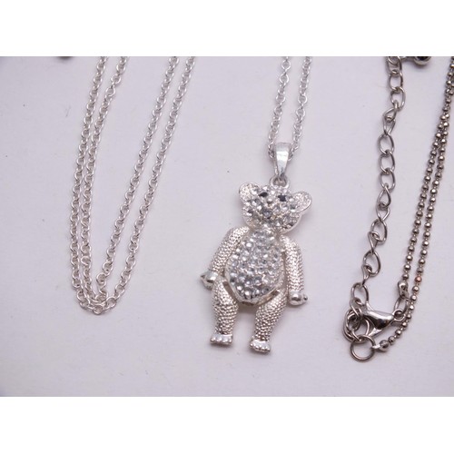 211 - 925 SILVER NECKLACE & TWO WHITE METAL NECKLACES INCLUDES ARTICULATED TEDDY PENDANT