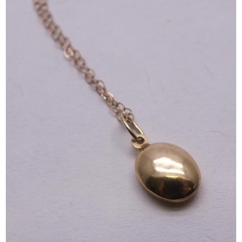 49 - 9ct GOLD COFFEE BEAN PENDANT ON 9ct CHAIN