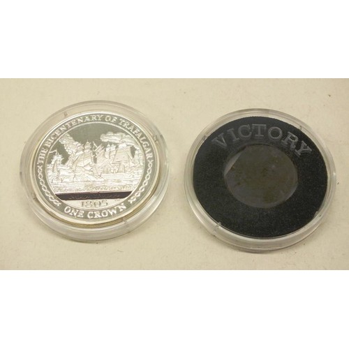 63 - ISLE OF MAN SILVER COIN WITH PIECE OF HMS VICTORY