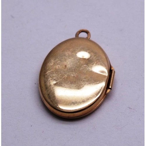 94 - 9CT GOLD DIAMOND LOCKET- 2G