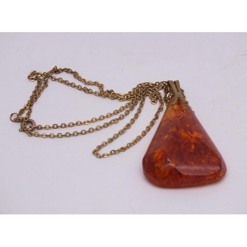 260 - VINTAGE GENUINE AMBER PENDANT ON GOLD PLATED CHAIN, PENDANT SIZE 4cm x 3cm