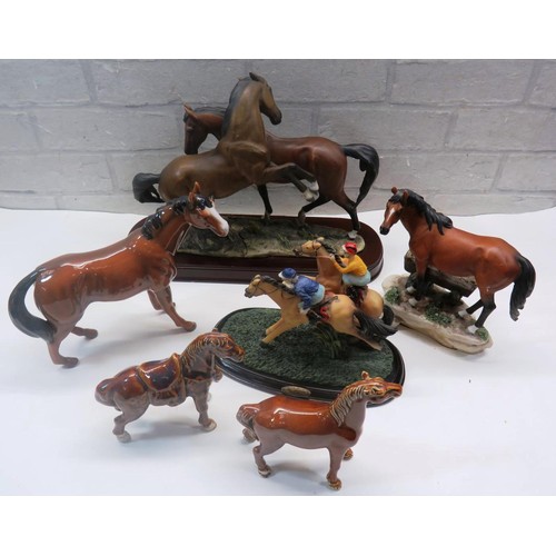 200 - COLLECTION OF CERAMIC HORSE ORNAMENTS