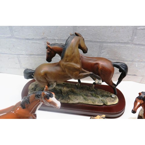 200 - COLLECTION OF CERAMIC HORSE ORNAMENTS