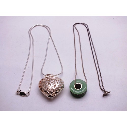 192 - TWO STERLING SILVER PENDANTS, NECKLACES