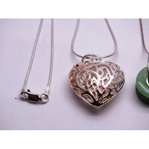 192 - TWO STERLING SILVER PENDANTS, NECKLACES