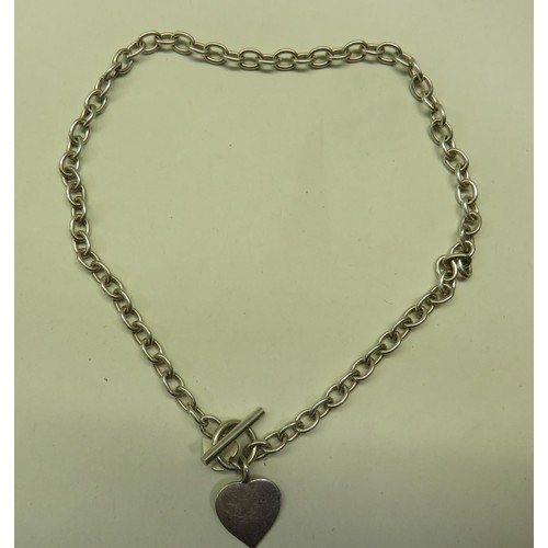 285 - HEAVY SILVER NECKLACE AND HEART PENDANT