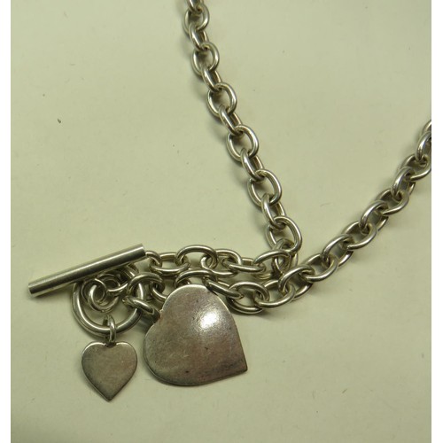 285 - HEAVY SILVER NECKLACE AND HEART PENDANT