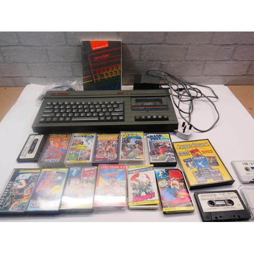 258 - VINTAGE SINCLAIR ZX SPECTRUM COMPLETE WITH CABLES, GAMES & INSTRUCTIONS - WORKING ORDER