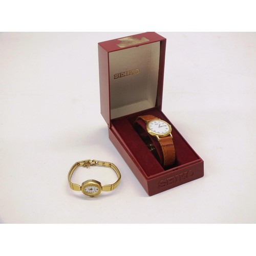 312 - SEIKO QUARTZ WRISTWATCH WITH LEATHER STRAP IN BOX PLUS A GOLD TONE BULER WATCH