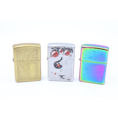 443 - 3 x Assorted ZIPPO Lighters Inc Vintage, Brass, Plain, Iridescent Etc