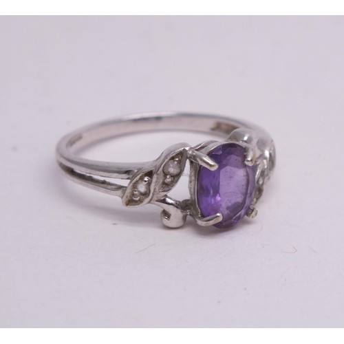 346 - 9CT WHITE GOLD PUPRPLE STONE RING SIZE N- 2.1G