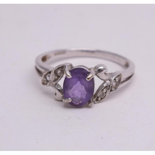 346 - 9CT WHITE GOLD PUPRPLE STONE RING SIZE N- 2.1G