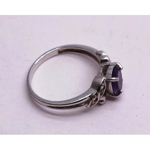 346 - 9CT WHITE GOLD PUPRPLE STONE RING SIZE N- 2.1G