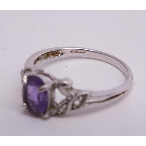 346 - 9CT WHITE GOLD PUPRPLE STONE RING SIZE N- 2.1G