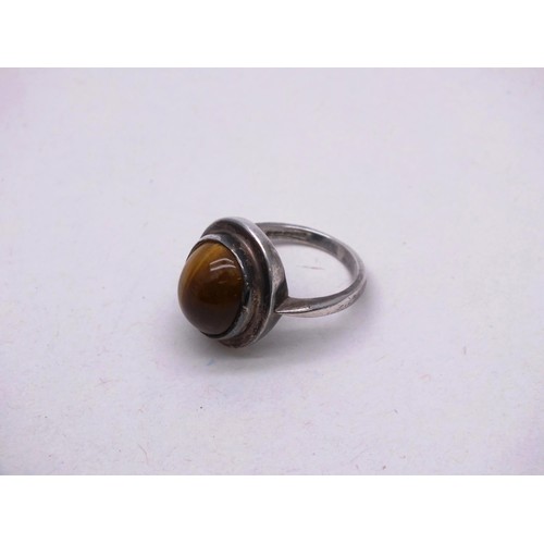 388 - ANTIQUE SILVER CARNELIAN SOLITAIRE RING SIZE E AND ANTIQUE SILVER TIGERS EYE SOLITAIRE RING - SIZE K