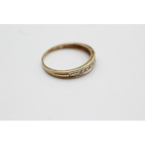 568 - 9ct gold diamond eternity ring (1.3g) size K