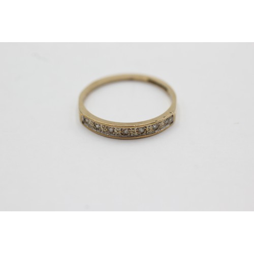 580 - 9ct gold diamond half-eternity ring (1.2g)Size- N