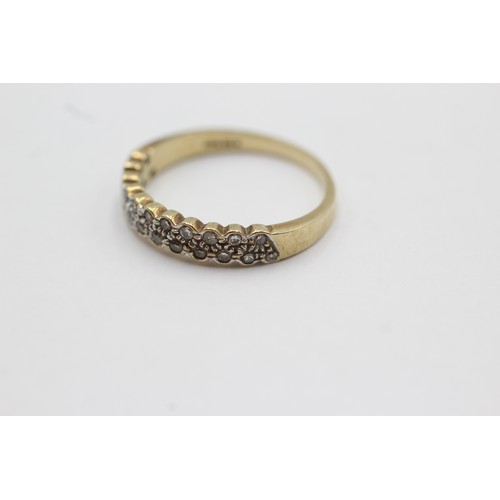 588 - 9ct gold diamond double row half-eternity ring (2.4g)Size- P