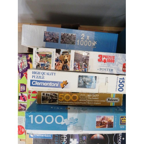 198 - TWO BOXES OF JIGSAWS