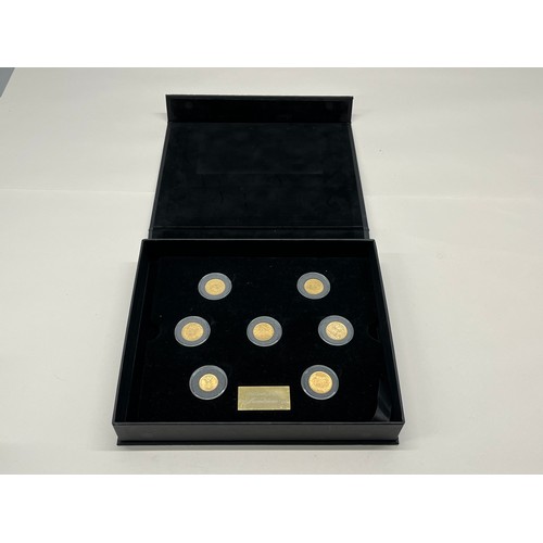 300N - THE CENTURY OF GOLD 
GOLDS GREATEST YEARS 
THE LONDON MINT OFFICE 
7 GOLD COIN COLLECTION