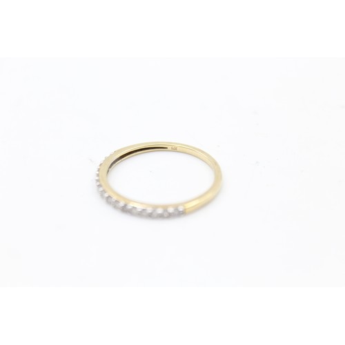 242 - 9ct gold diamond half eternity ring (1.3g) size S