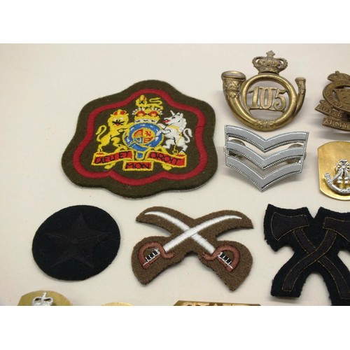 239 - BAG OF VARIOUS MILITARY BADGES