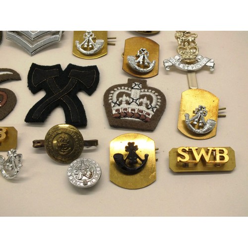 239 - BAG OF VARIOUS MILITARY BADGES