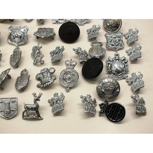 241 - BAG OF VARIOUS POLICE BADGES