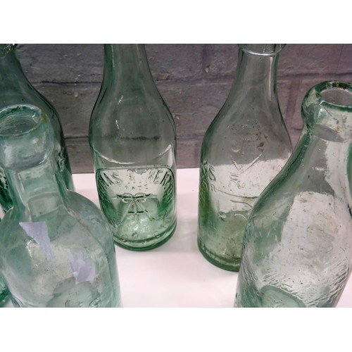 194 - 11 VINTAGE POP BOTTLES