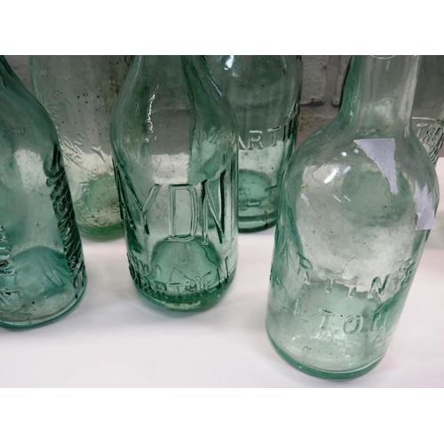 194 - 11 VINTAGE POP BOTTLES