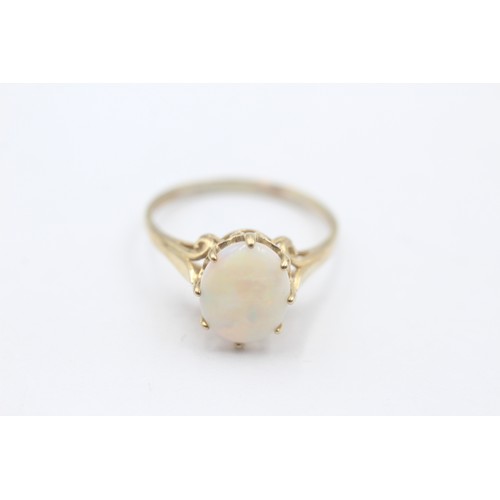 464 - 9ct gold opal solitaire statement ring (1.8g) SIZE O