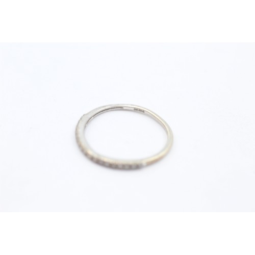 496 - 9ct white gold diamond half-eternity ring (0.9g) SIZE N