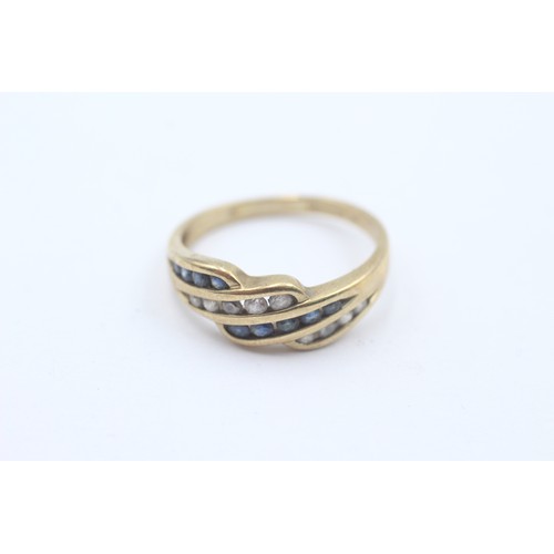 512 - 9ct gold sapphire & clear gemstone wave setting ring (2.5g) SIZE O