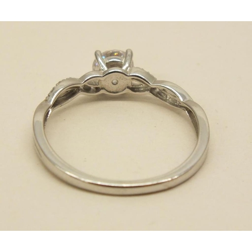 324 - 9ct WHITE GOLD CZ STONE RING SIZE O. 1.6g