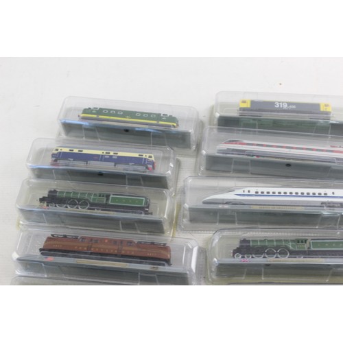 680 - 12 x Boxed Model Display Trains Inc White Rose, Flying Scotsman Etc