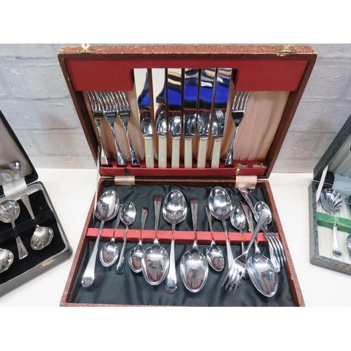 83 - 4 x BOXED DINING SETS TO INCLUDE CUTLERY CARVING ETC