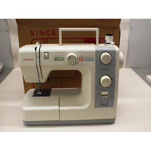 55 - ELECTRIC SINGER SEWING MACHINE IN GOOD WORKING ORDER- BOXED