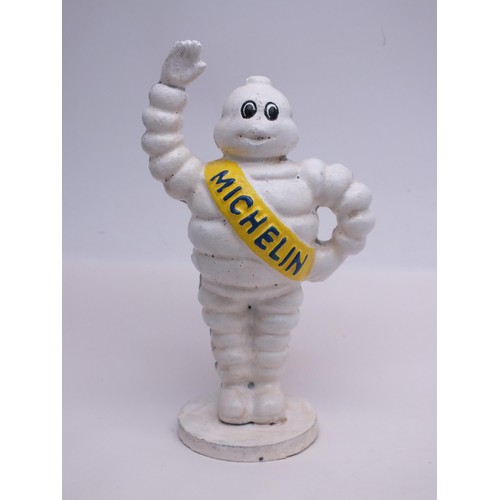 18 - CAST IRON MICHELIN MAN MONEY BOX