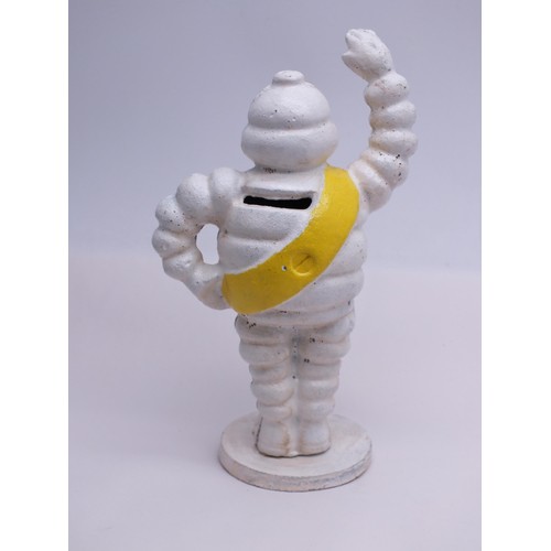 18 - CAST IRON MICHELIN MAN MONEY BOX