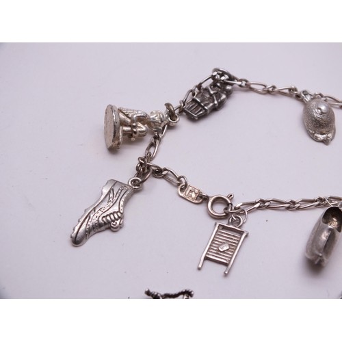 45 - TWO SILVER CHARM BRACELETS