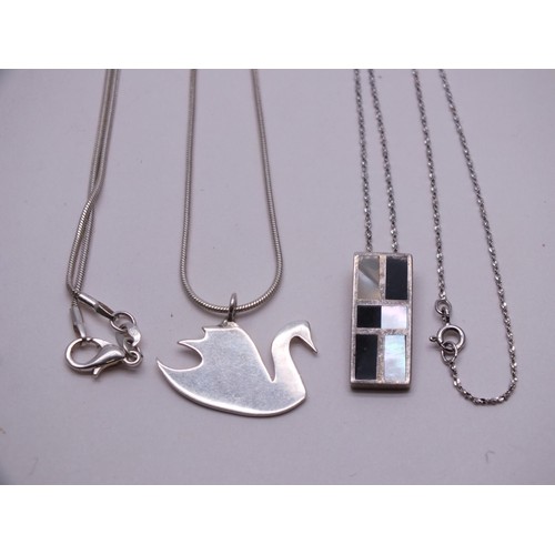 51 - FOUR SILVER NECKLACES