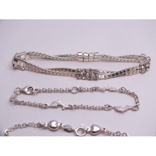 52 - SIX SILVER BRACELETS