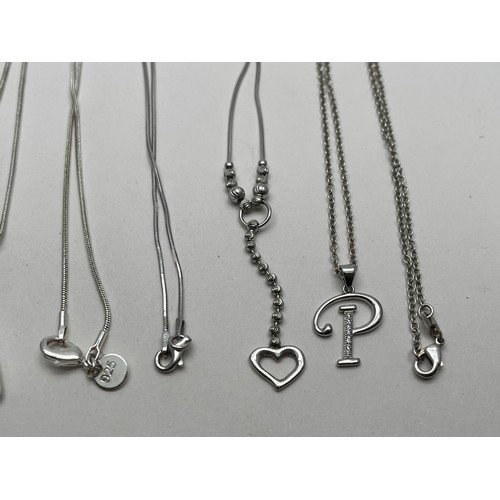 43 - FOUR SILVER NECKLACES