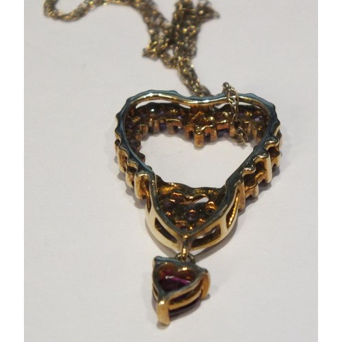 53 - 9CT GOLD AND AMETHYST PENDANT ON 19