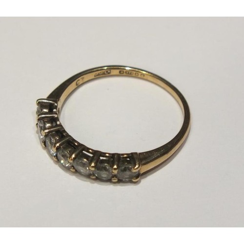 216 - 9CT GOLD RING 7CZ STONES SIZE N- 1.8G