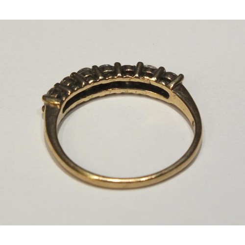 216 - 9CT GOLD RING 7CZ STONES SIZE N- 1.8G