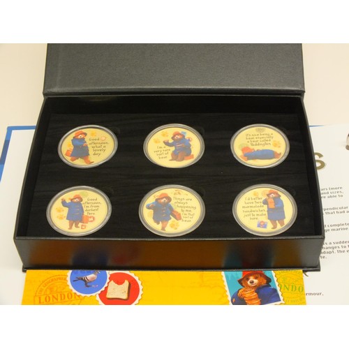 75 - PADDINGTON THE OFFICIAL COMMEMORATIVE SET AND THE DINOSAURS DISCOVERY COLLECTION IN ALBUM